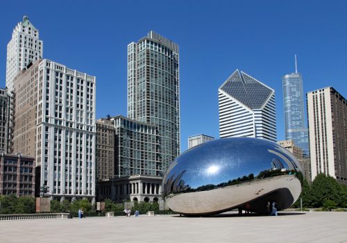 CHICAGO -  The Cloud Gate sculpture, popularly known as the bean, with Chicago's skyline